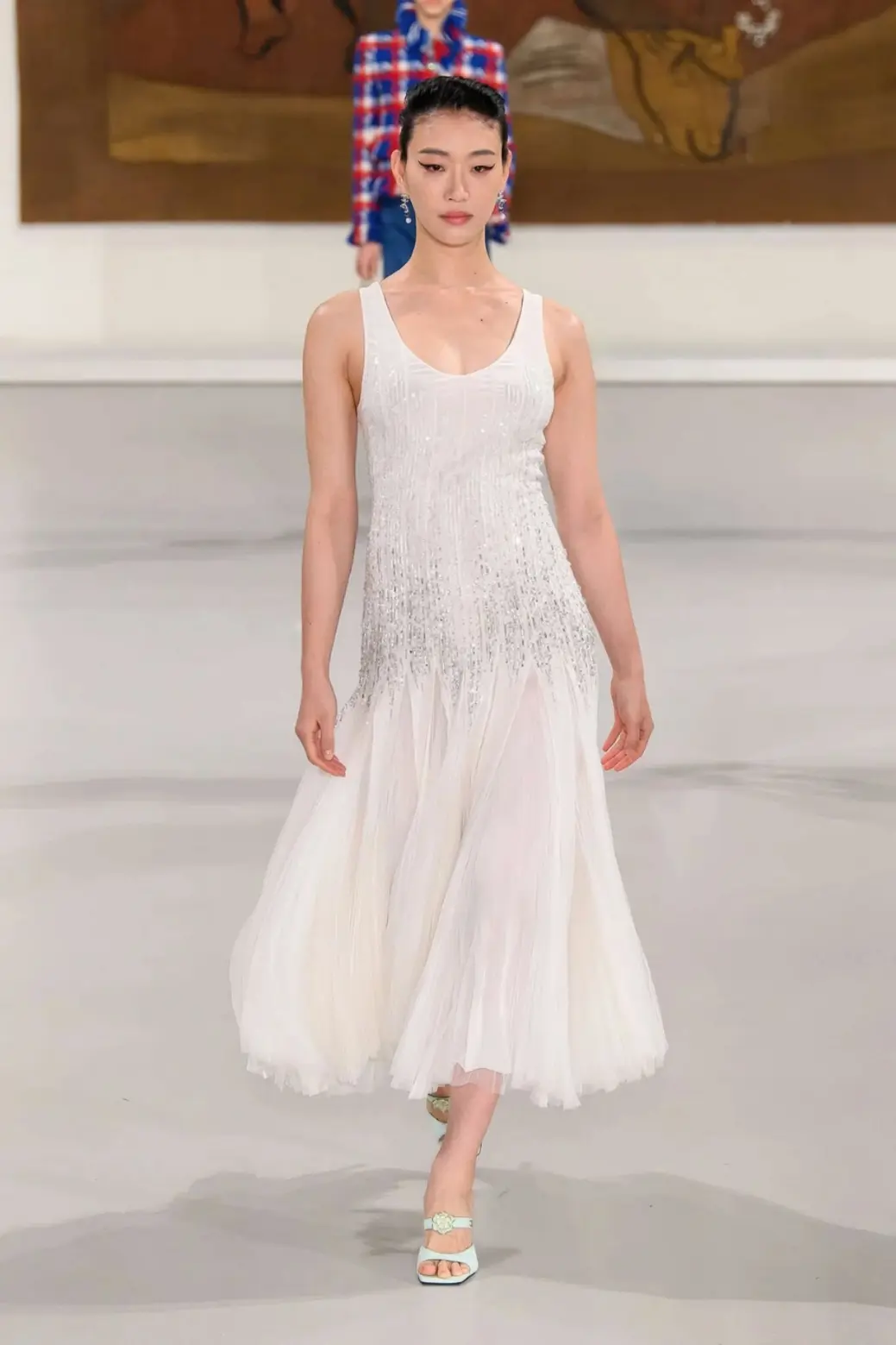 Sora Choi para Chanel, desfilando grávida